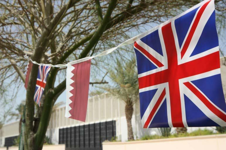 UK and Qatar flags