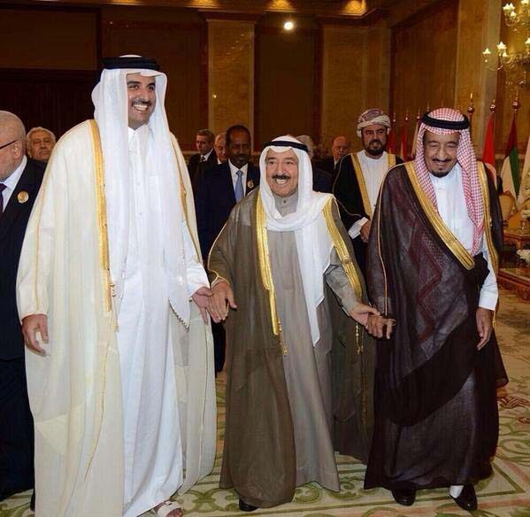 Kuwait's Sheikh Sabah, standing between Saudi Crown Prince Salman and Qatar's emir.