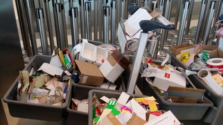 Staff at DIA scrap old papers, luggage tags and other items before heading over to the new Hamad International Airport.