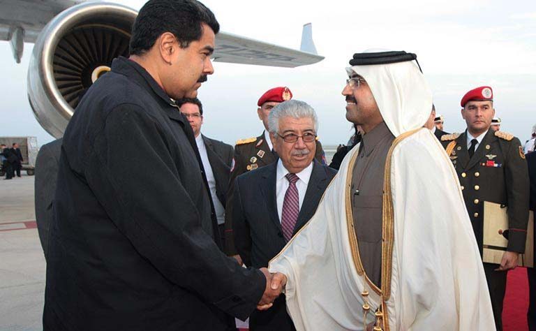 Venezuelan President Nicolas Maduro, left, with Qatar's Minister of Energy and Industry, Mohammed bin Saleh Al Sada.