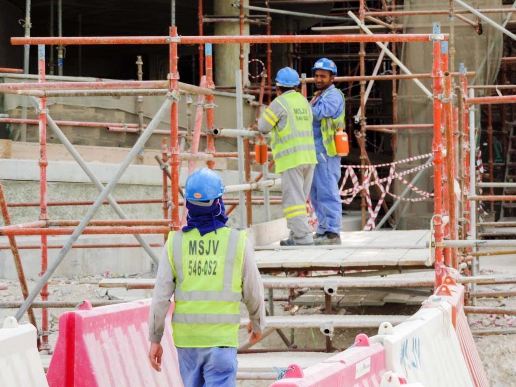 Construction workers at the Khalifa Stadium