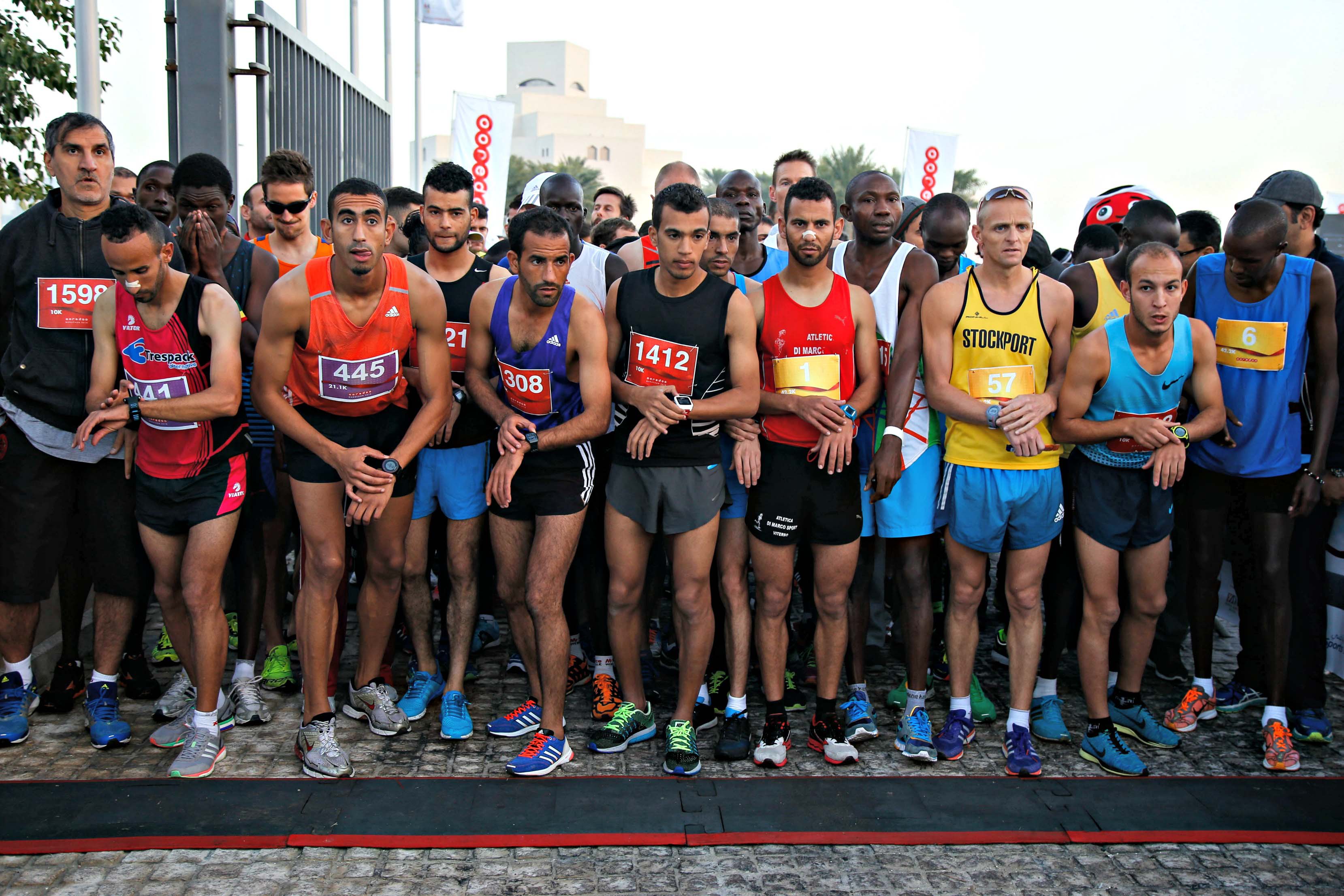 Qatar runners test limits at Ooredoo marathon - Doha News