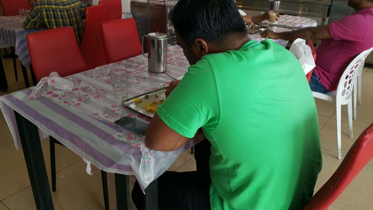 Customer eating at Sharwa Restaurant