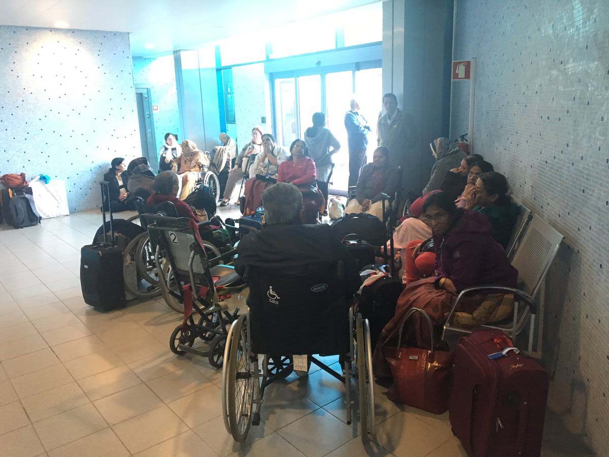 Passengers from flight QR708 waiting at Lajes